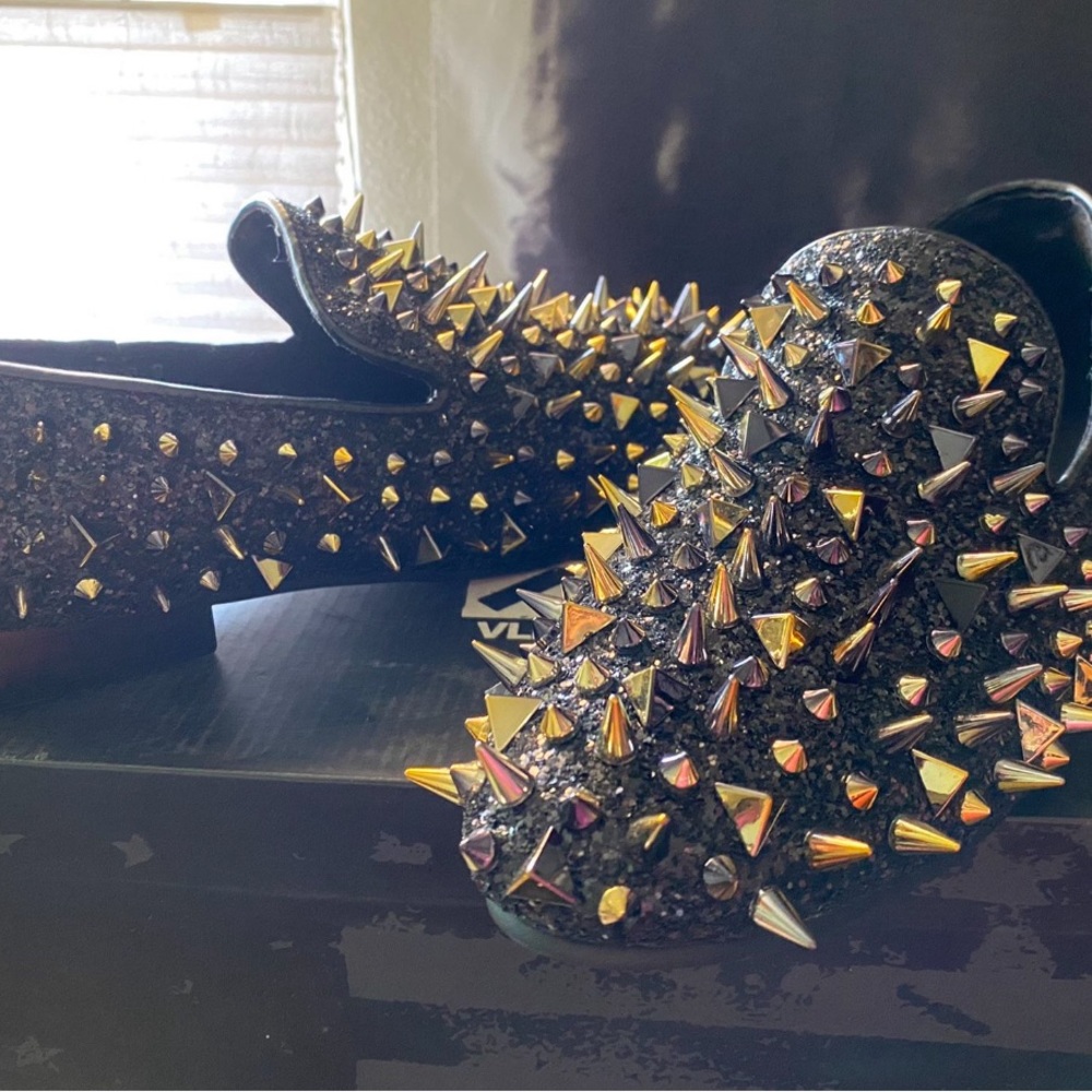 Black glitter gold spikes Fiesso by Aurelio Garcia